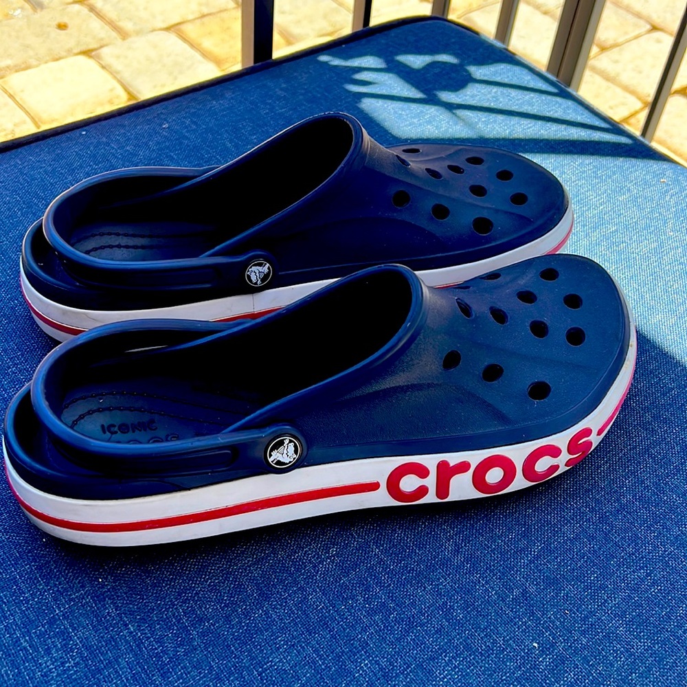 Crocs—blue and white with red stripe. Size 12. Gently worn.
